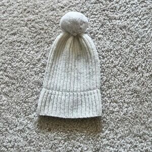 white beenie with pom